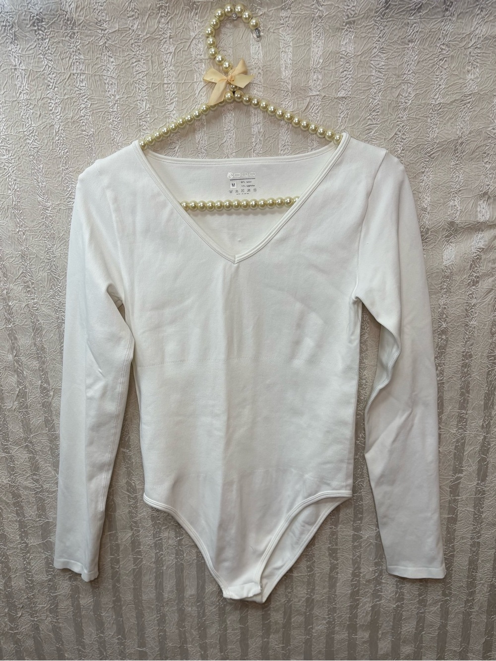 OQQ White Long Sleeve V-Neck Bodysuit Ribbed size Small